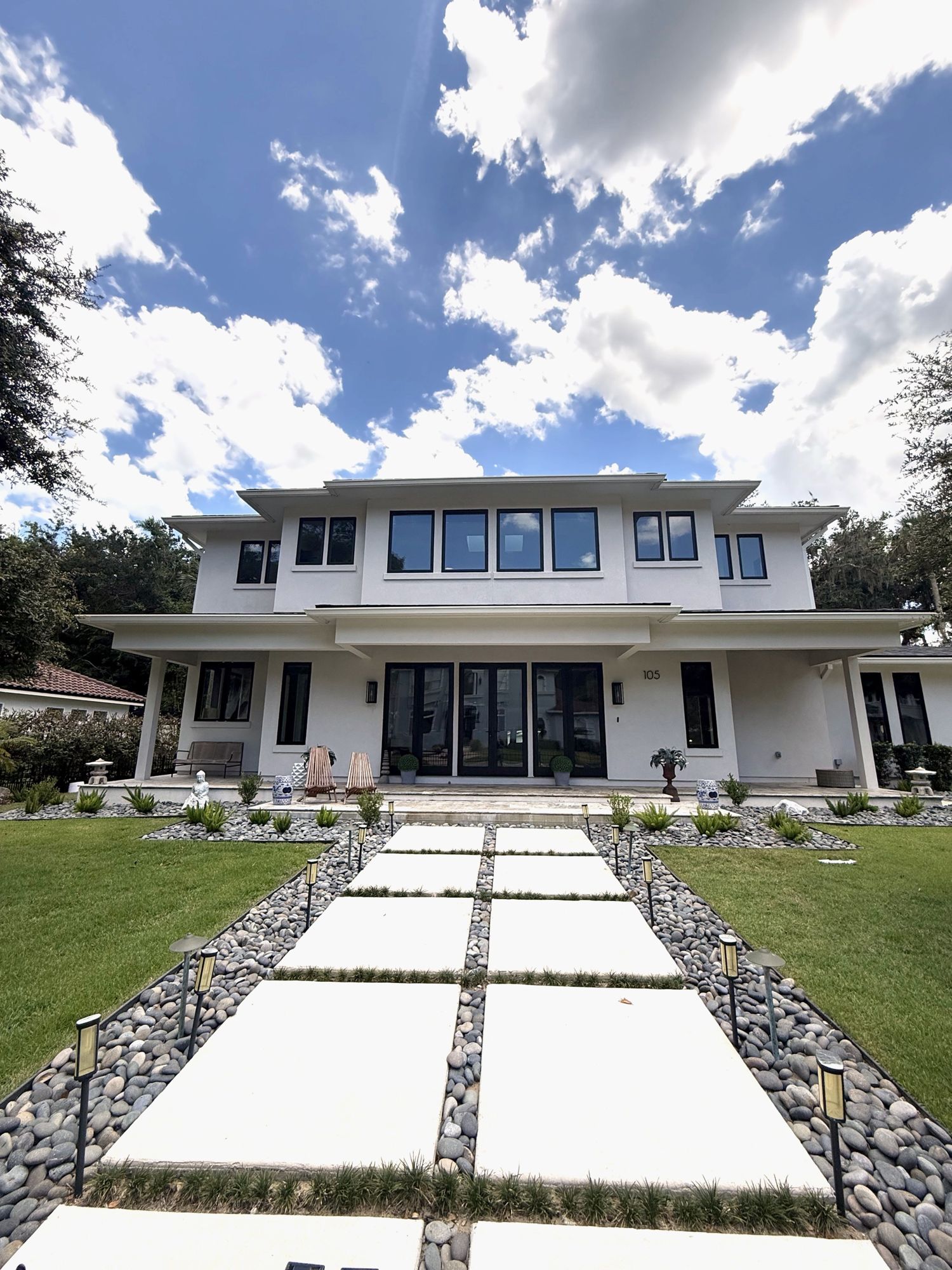 Front of 105 Bent Oak Drive with its lit stone walkway